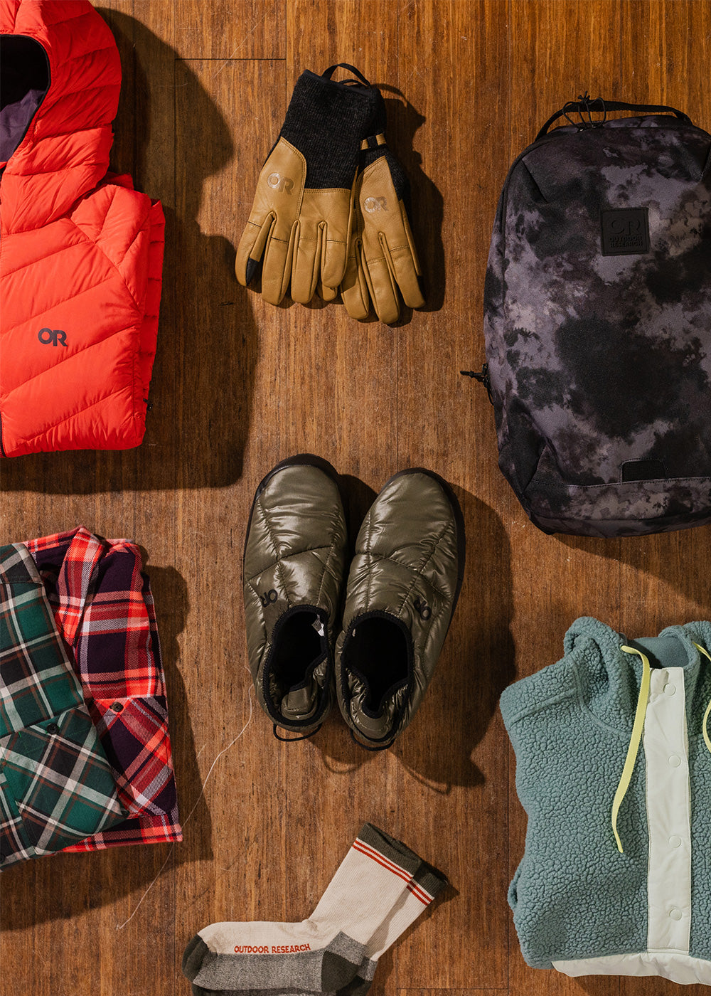 View from above of a variety of Outdoor Research winter products.