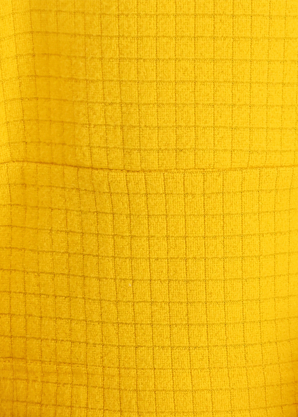 Close up of Mega Trail Mix fleece fabric in yellow.